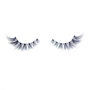 A close up of fake eyelashes on a white backdrop. The fake eyelashes are very soft looking and get gradually longer from inner to outer corner.