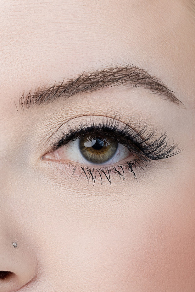 A close up of fake eyelashes on a models eye